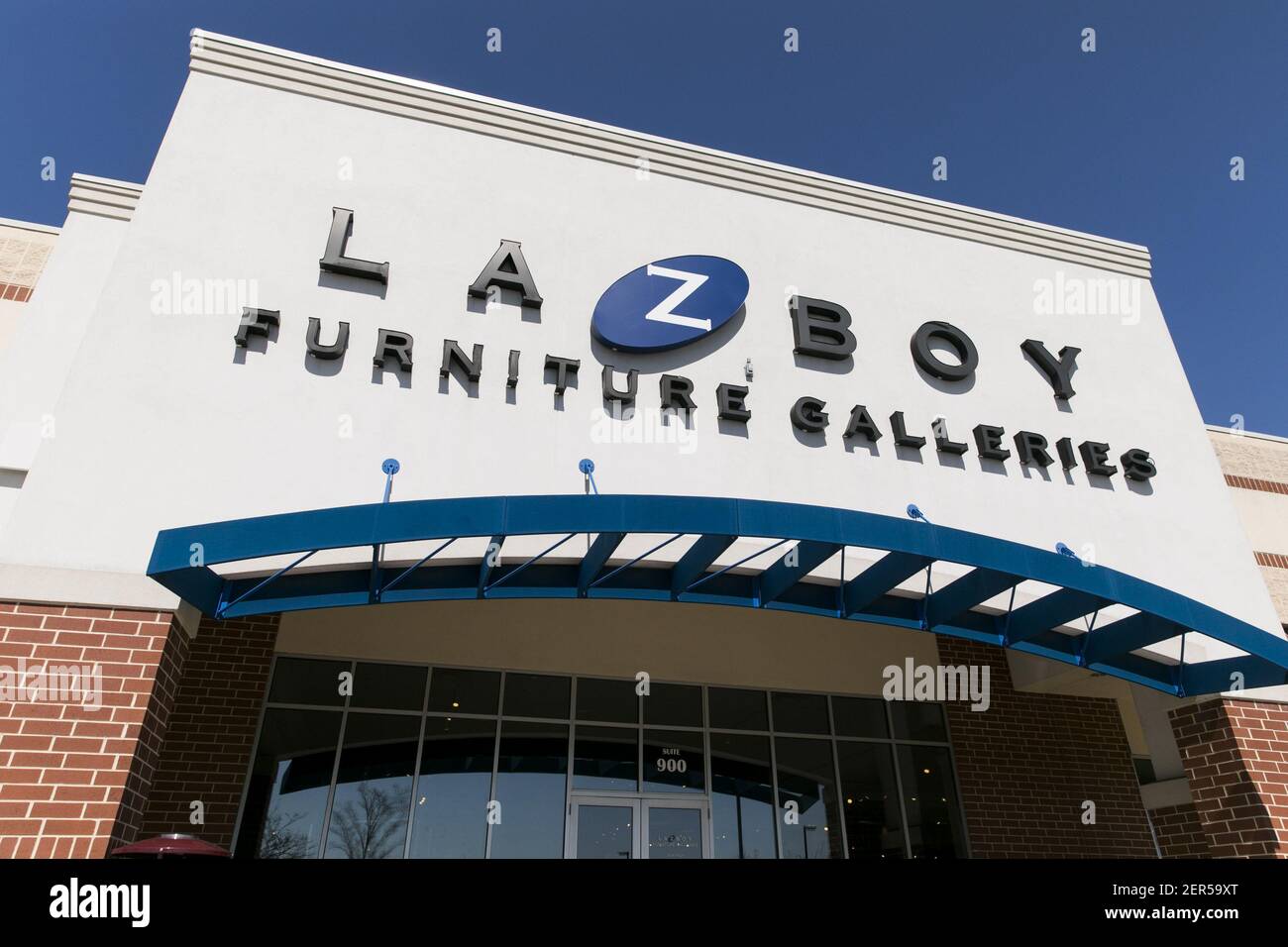 A logo sign outside of a LaZBoy retail store location in Columbia