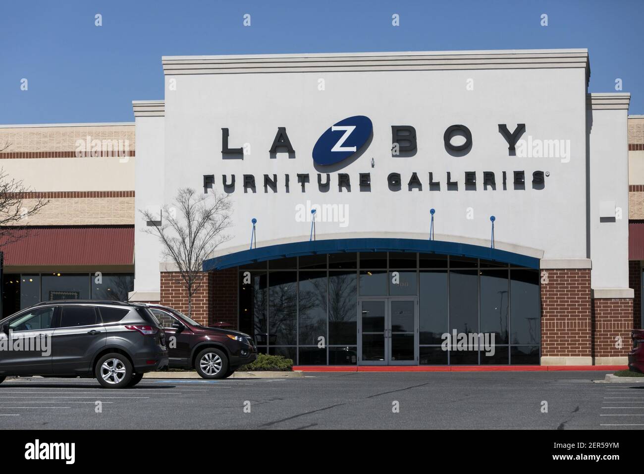 A logo sign outside of a LaZBoy retail store location in Columbia
