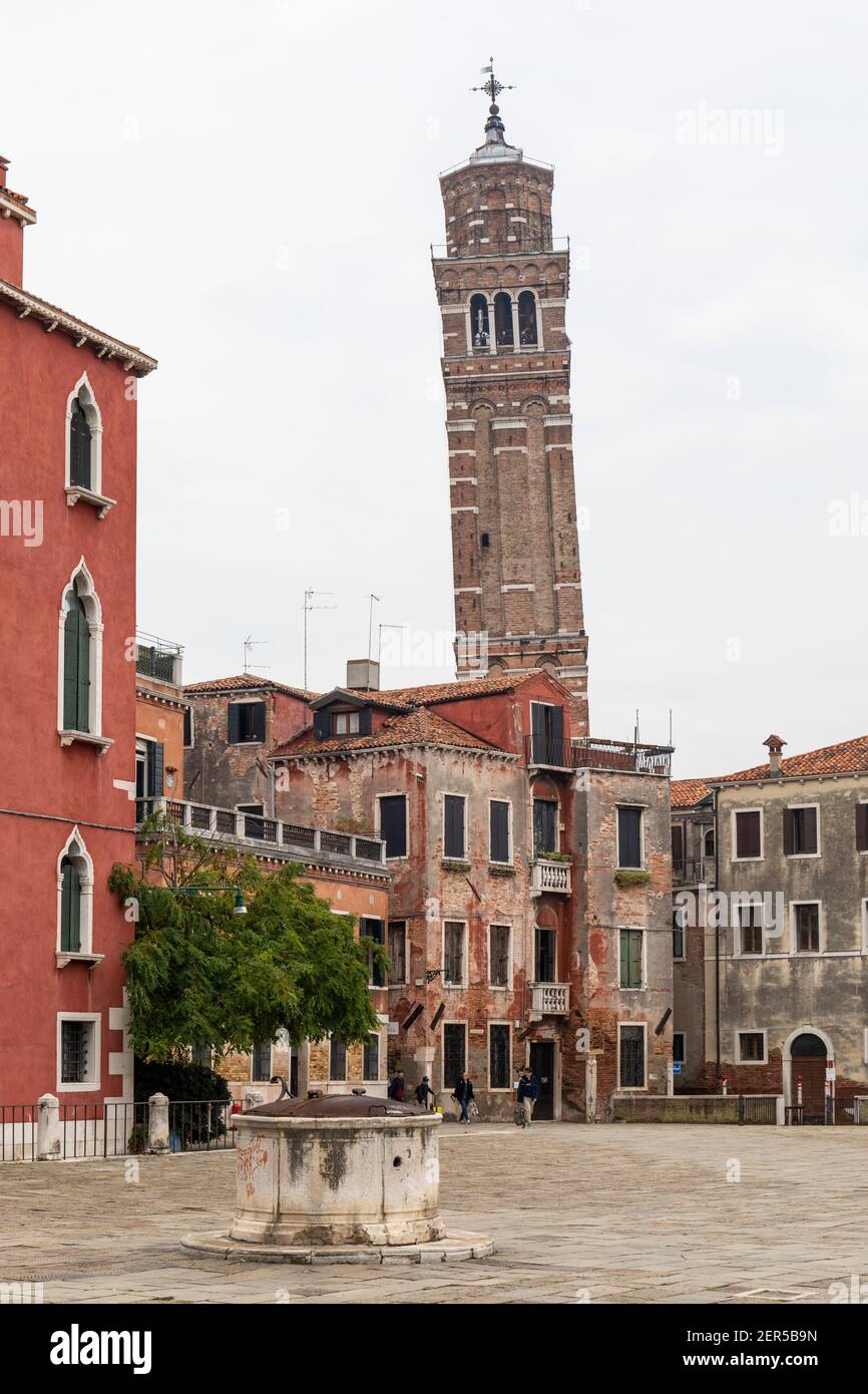 The leaning bell tower / campanile of Santo Stefano, Campo Sant'Angelo, San Marco, Venice, Italy Stock Photo
