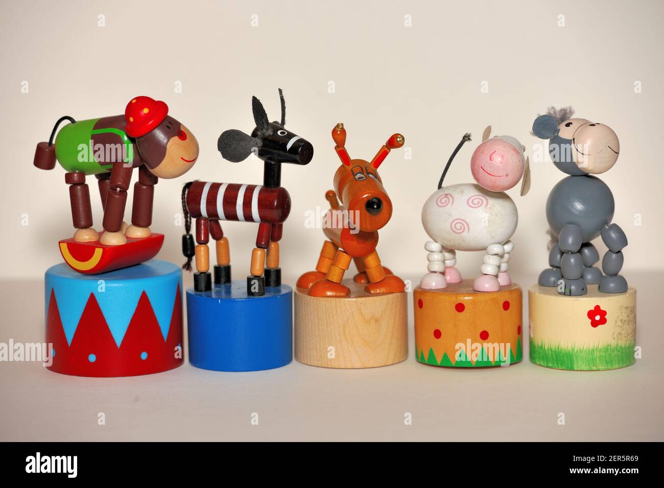 Collection of Wooden Animal Push up Puppets Stock Photo