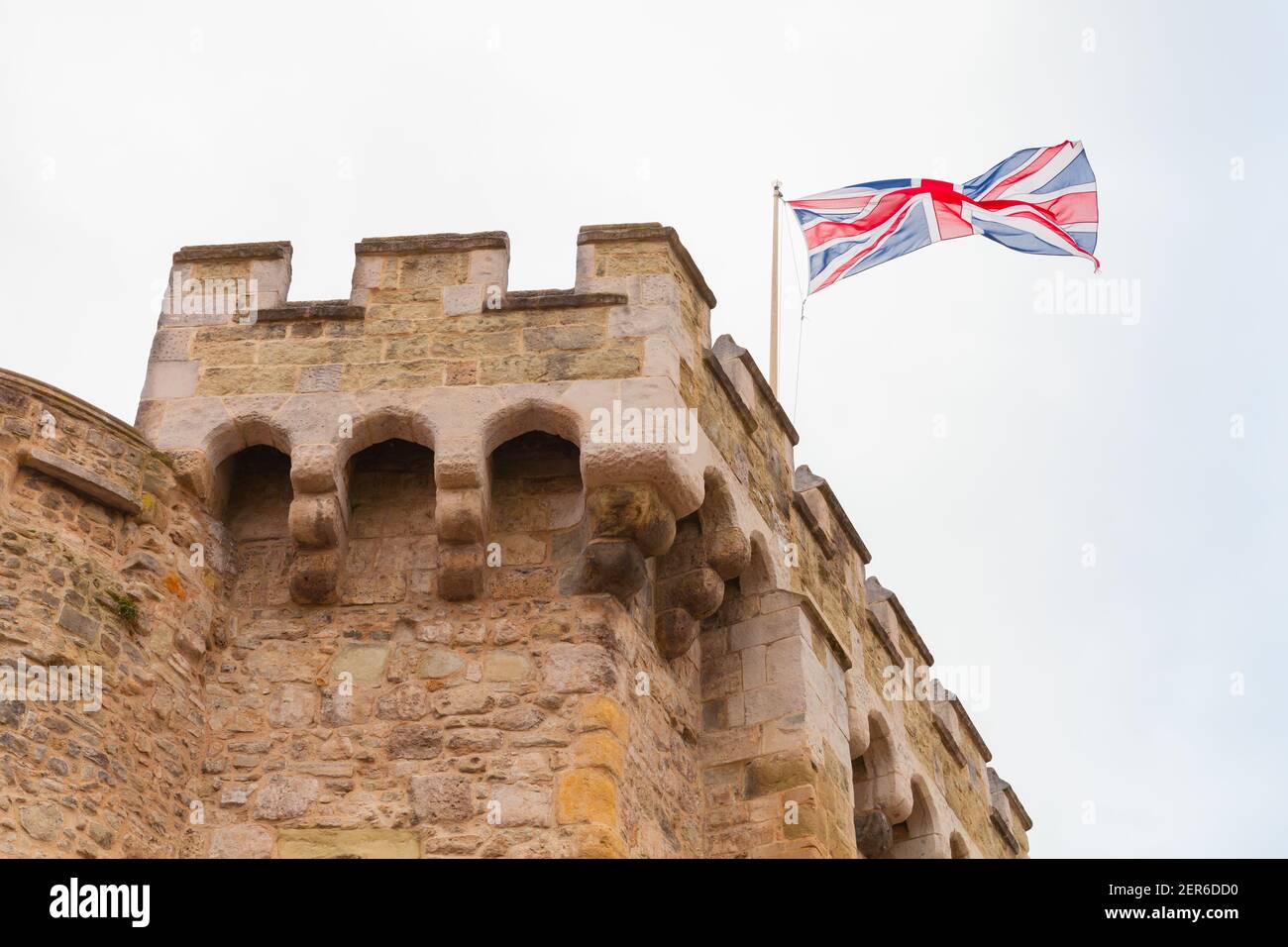 British flag is on the Bargate. It is a medieval gatehouse in the city of Southampton, England. Constructed in Norman times as part of the Southampton Stock Photo