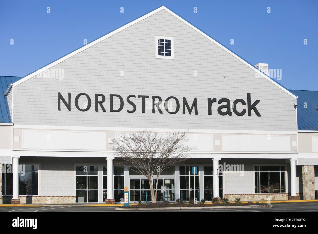 A logo sign outside of a Nordstrom Rack retail store in Annapolis