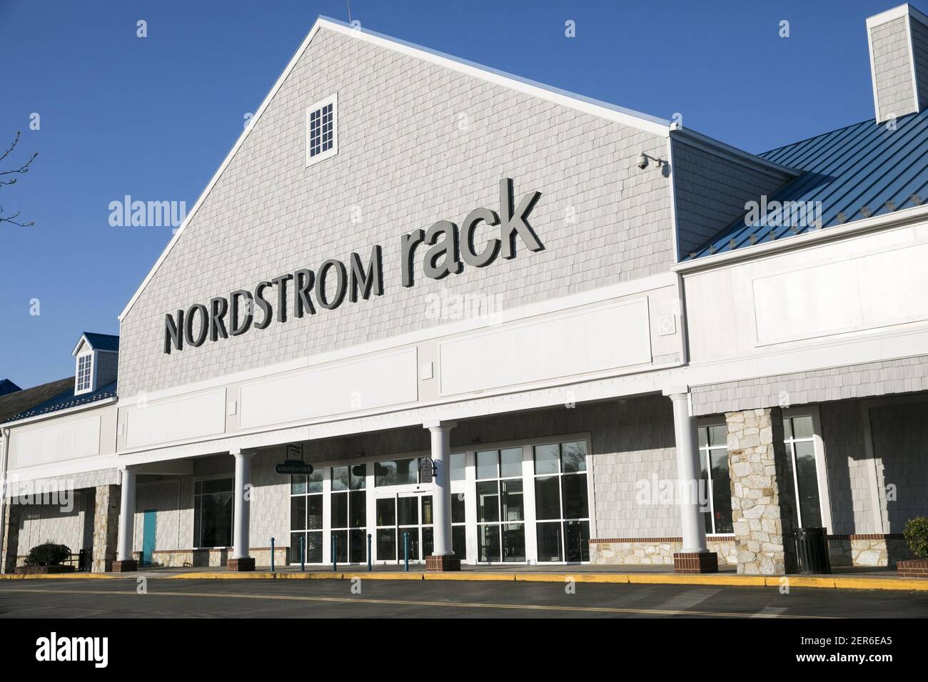 A logo sign outside of a Nordstrom Rack retail store in Annapolis