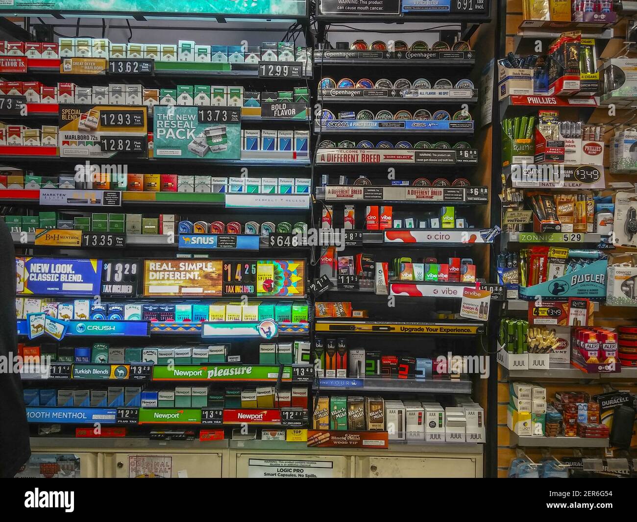 cigarette wall A wall of tobacco products in a convenience store in New York on Sunday,  April 29, 2018. (ÂPhoto by Richard B. Levine Stock Photo