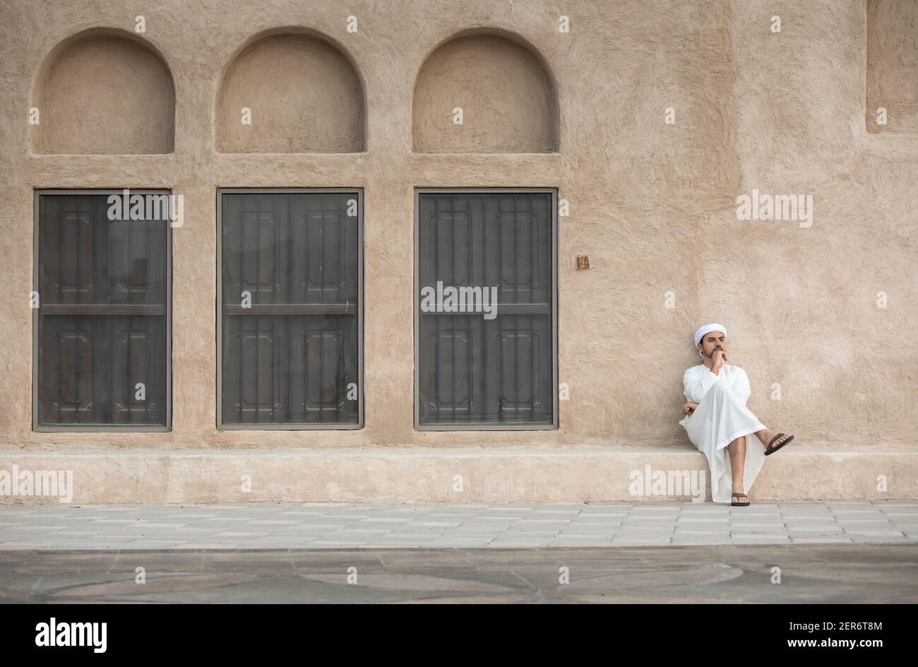 arab man in traditional clothing in historic Shindagha district of Dubai Stock Photo