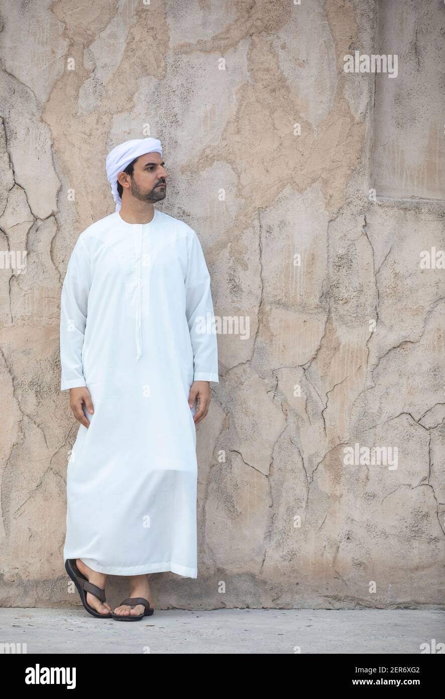 arab man in traditional clothing  in historic Shindagha district of Dubai Stock Photo