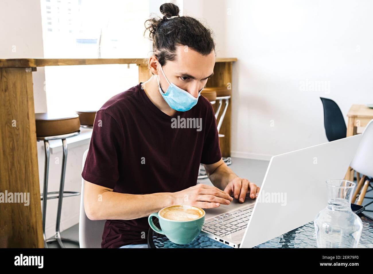 New normal lifestyle concept. Man freelancer wearing protective face ...