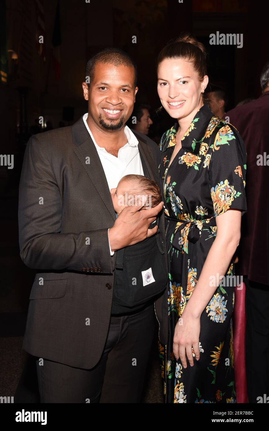 Damani Baker, Asa Baker Russell and Cameron Russell attend The