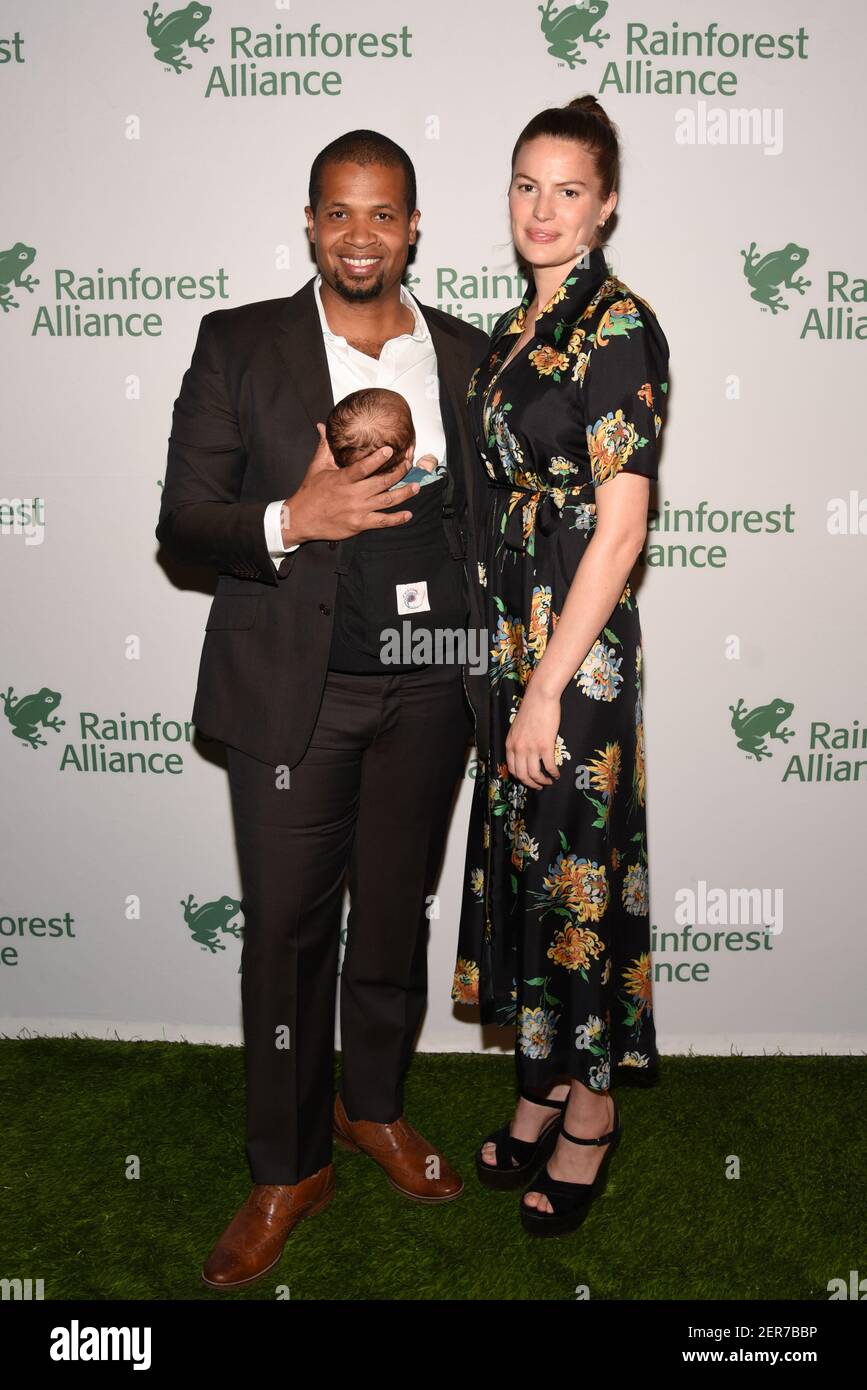 Damani Baker, Asa Baker Russell and Cameron Russell attend The