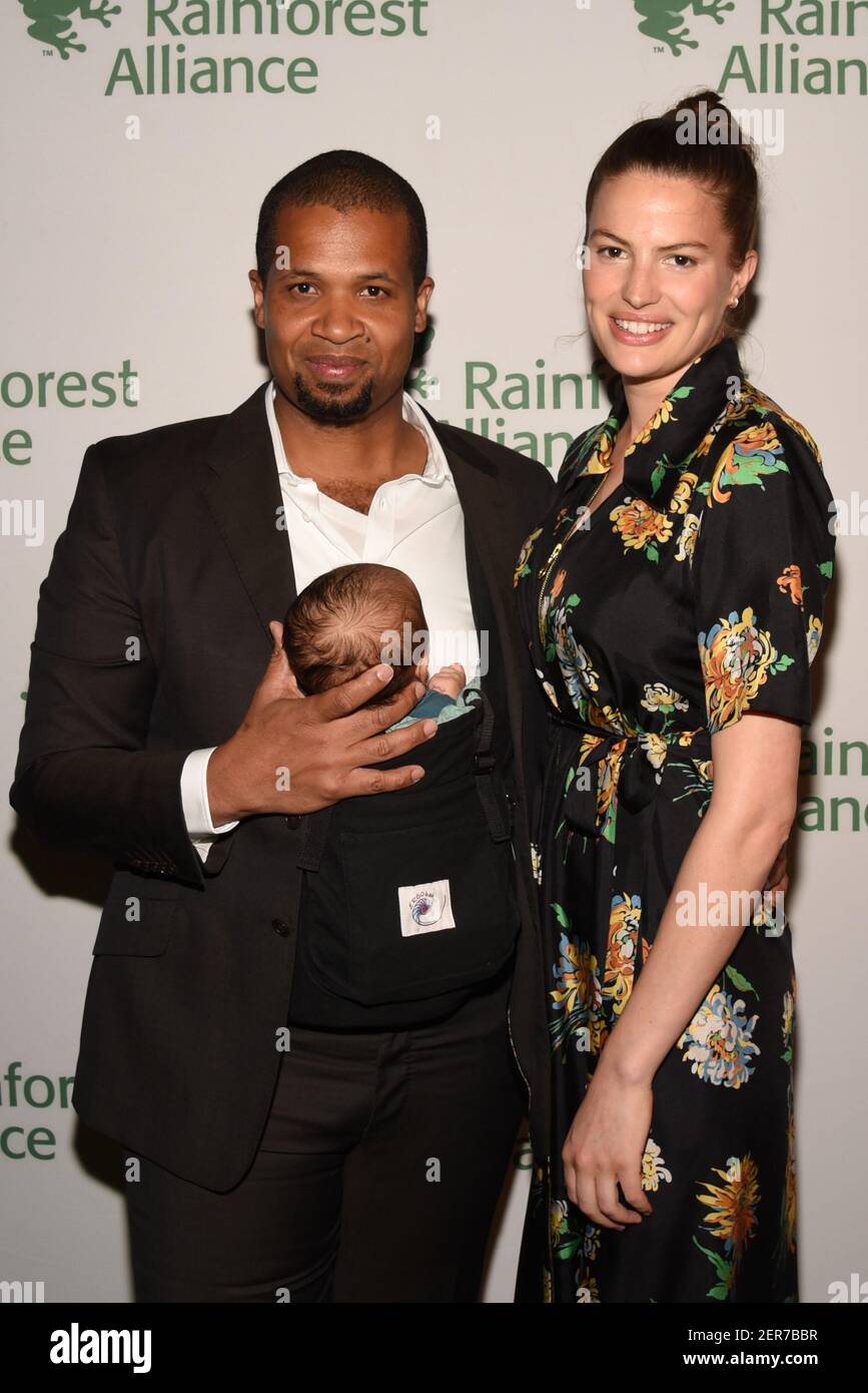 Damani Baker, Asa Baker Russell and Cameron Russell attend The