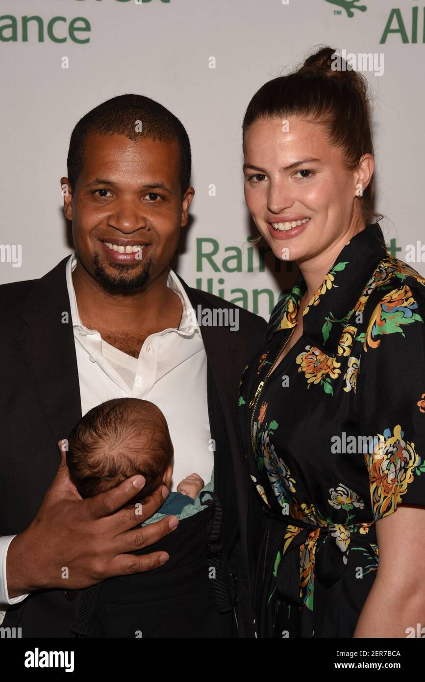 Damani Baker, Asa Baker Russell and Cameron Russell attend The