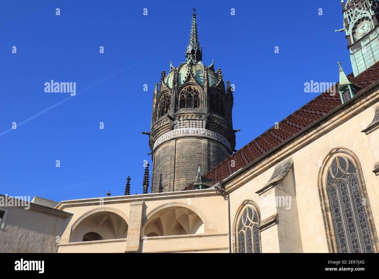 Wittenberg, Germany. 17th Jan, 2021. View of the Castle Church in the center of Lutherstadt. The Castle Church, also known as the Church of the Reformation, is a Protestant church in Lutherstadt Wittenberg and has been a UNESCO World Heritage Site since 1996. It is considered the starting point of the Reformation after Martin Luther spread his 95 Latin disputation theses from here on October 31, 1517. Credit: Peter Gercke/dpa-Zentralbild/ZB/dpa/Alamy Live News Stock Photo