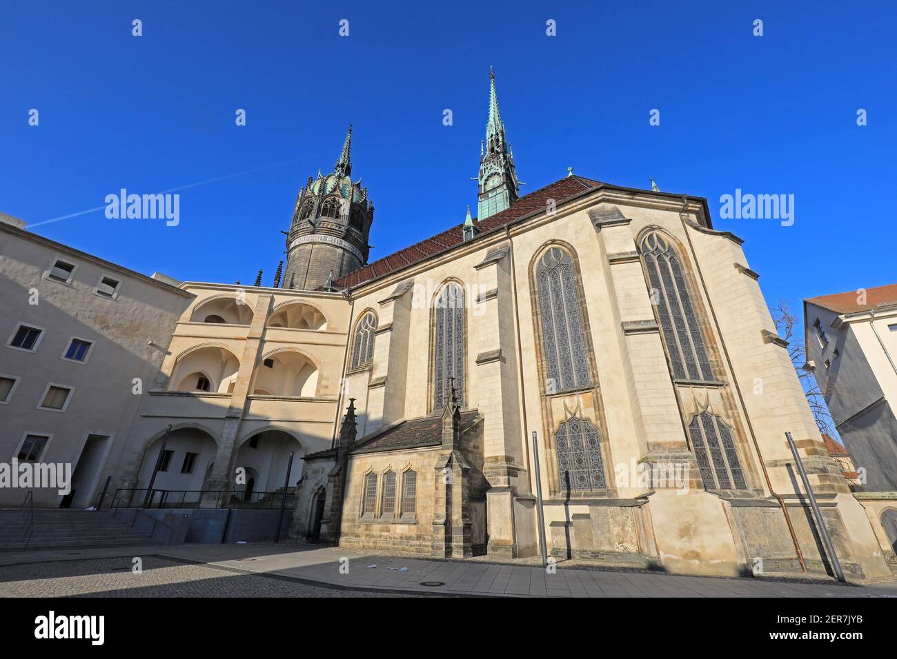 Wittenberg, Germany. 17th Jan, 2021. View of the Castle Church in the center of Lutherstadt. The Castle Church, also known as the Church of the Reformation, is a Protestant church in Lutherstadt Wittenberg and has been a UNESCO World Heritage Site since 1996. It is considered the starting point of the Reformation after Martin Luther spread his 95 Latin disputation theses from here on October 31, 1517. Credit: Peter Gercke/dpa-Zentralbild/ZB/dpa/Alamy Live News Stock Photo