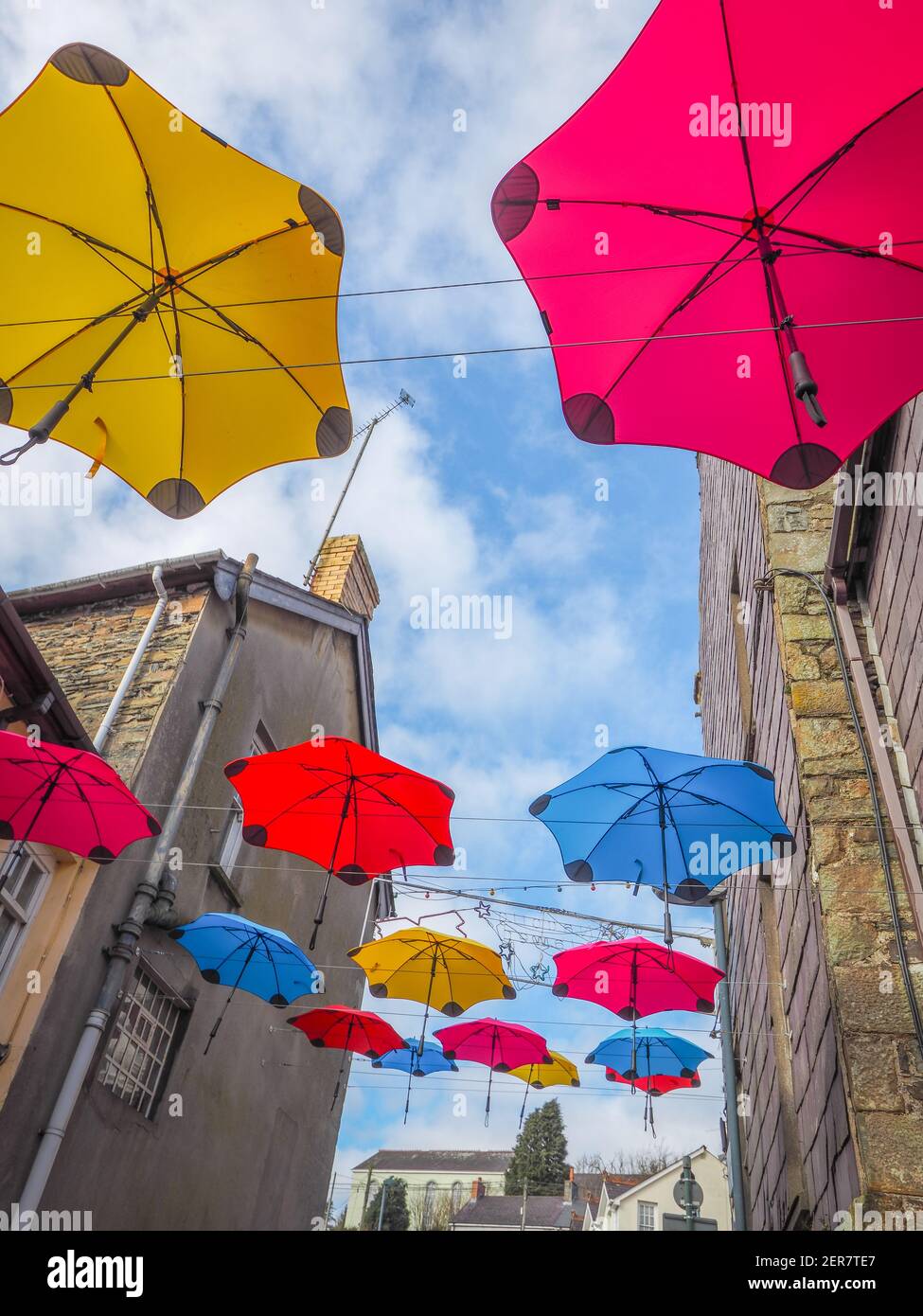 Brightly coloured umbrella art installation, Llandysul, Wales Stock Photo