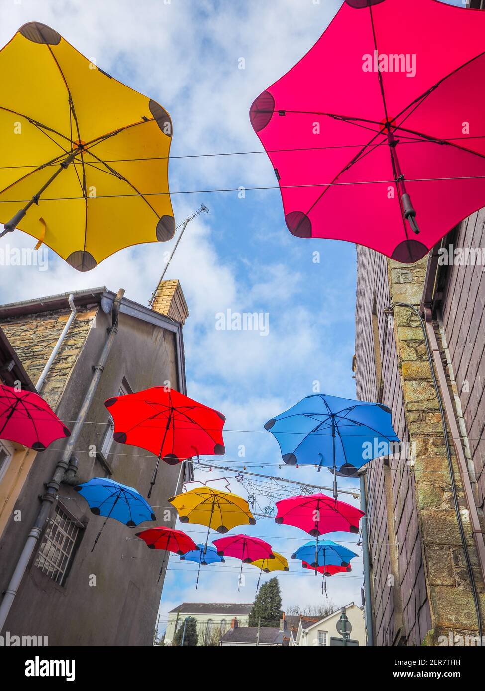 Brightly coloured umbrella art installation, Llandysul, Wales Stock Photo