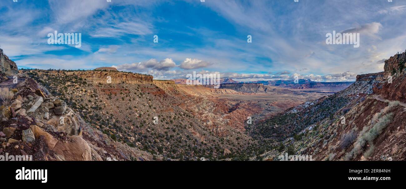 Panoramic view from the Arizona desert in winter from an elevated perspective with impressive cloud formations photographed during the day in the USA Stock Photo