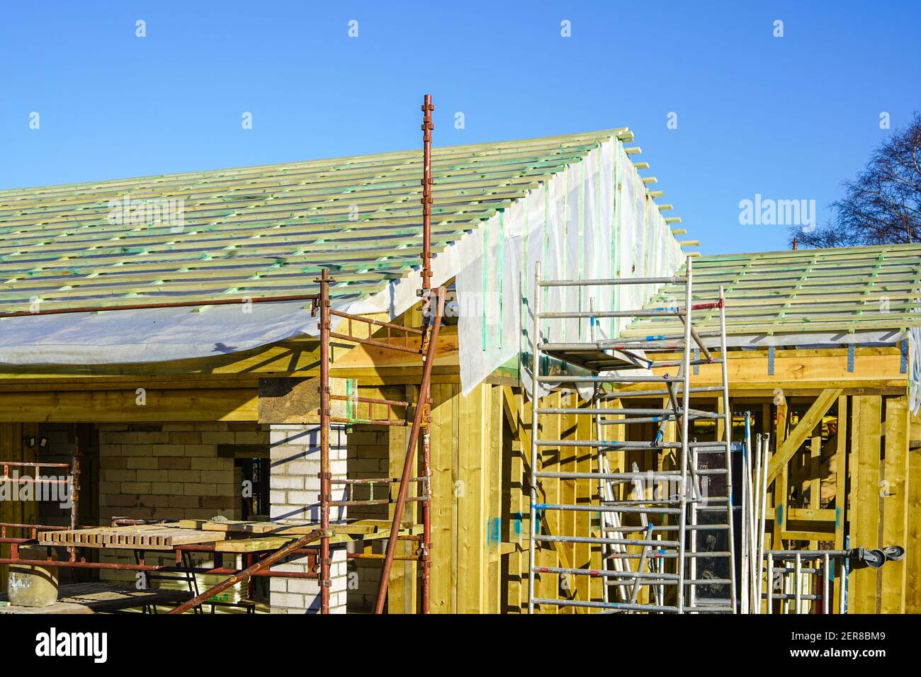 new modern wooden construction building in the construction