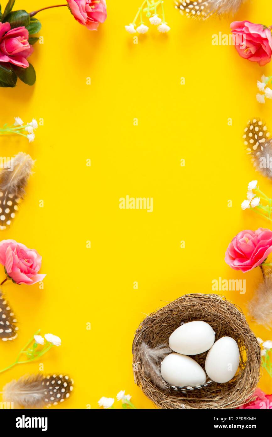 Easter arrangement on yellow background Stock Photo