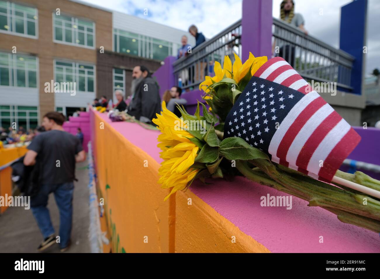 People gather at the Hollywood Transit Center in Portland, Ore., on May ...