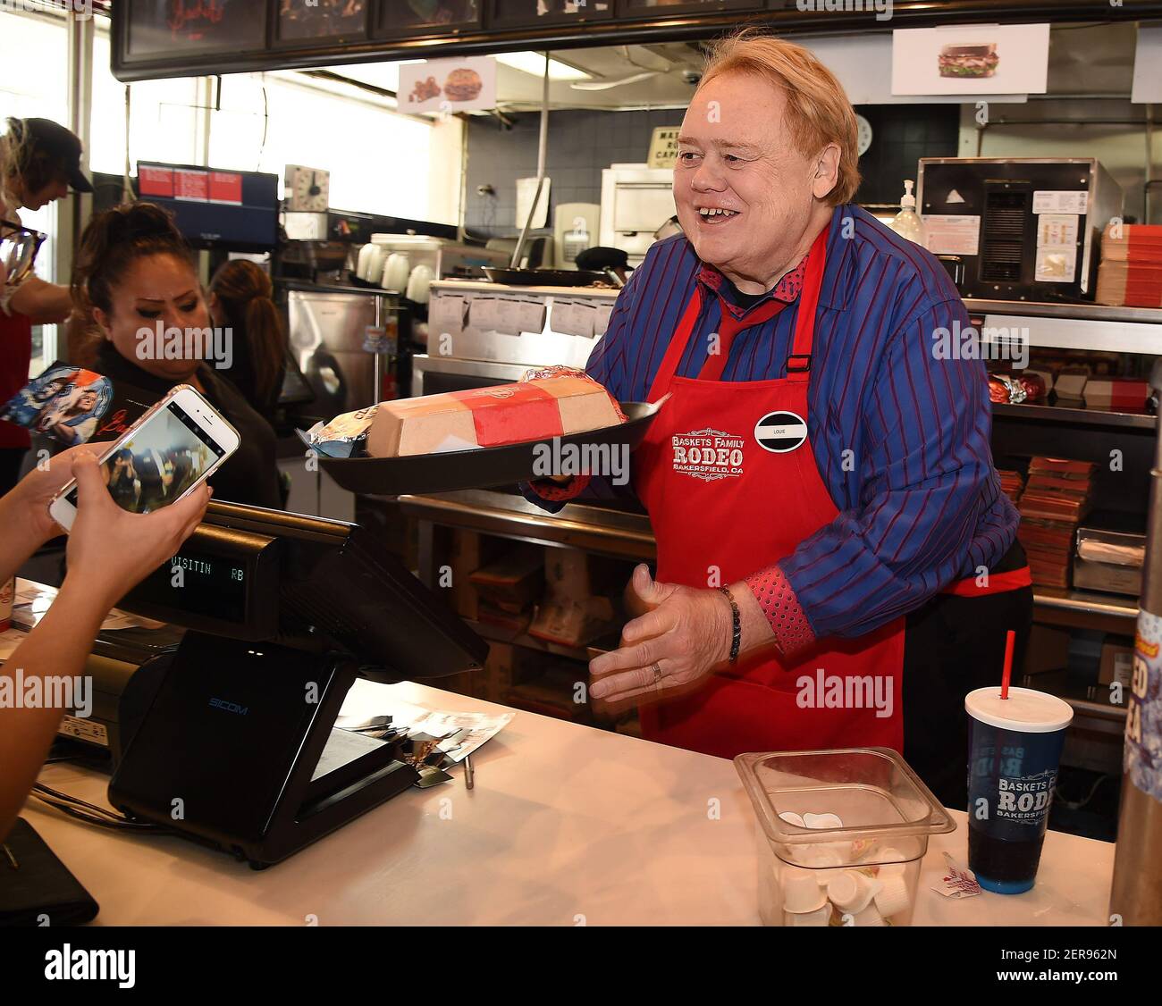 HOLLYWOOD, CA MAY 29 Louie Anderson works behind the counter at Arby