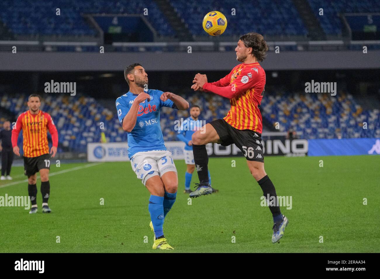 SSC Napoli's Algerian defender Faouzi Ghoulam  (L) challenges for the ball with BeneventoÕs Finnish midfielder Perparim Hetemaj during the Serie A football match between SSC Napoli and Benevento at the Diego Armando Maradona Stadium, Naples, Italy, on 03 February  2021 Stock Photo