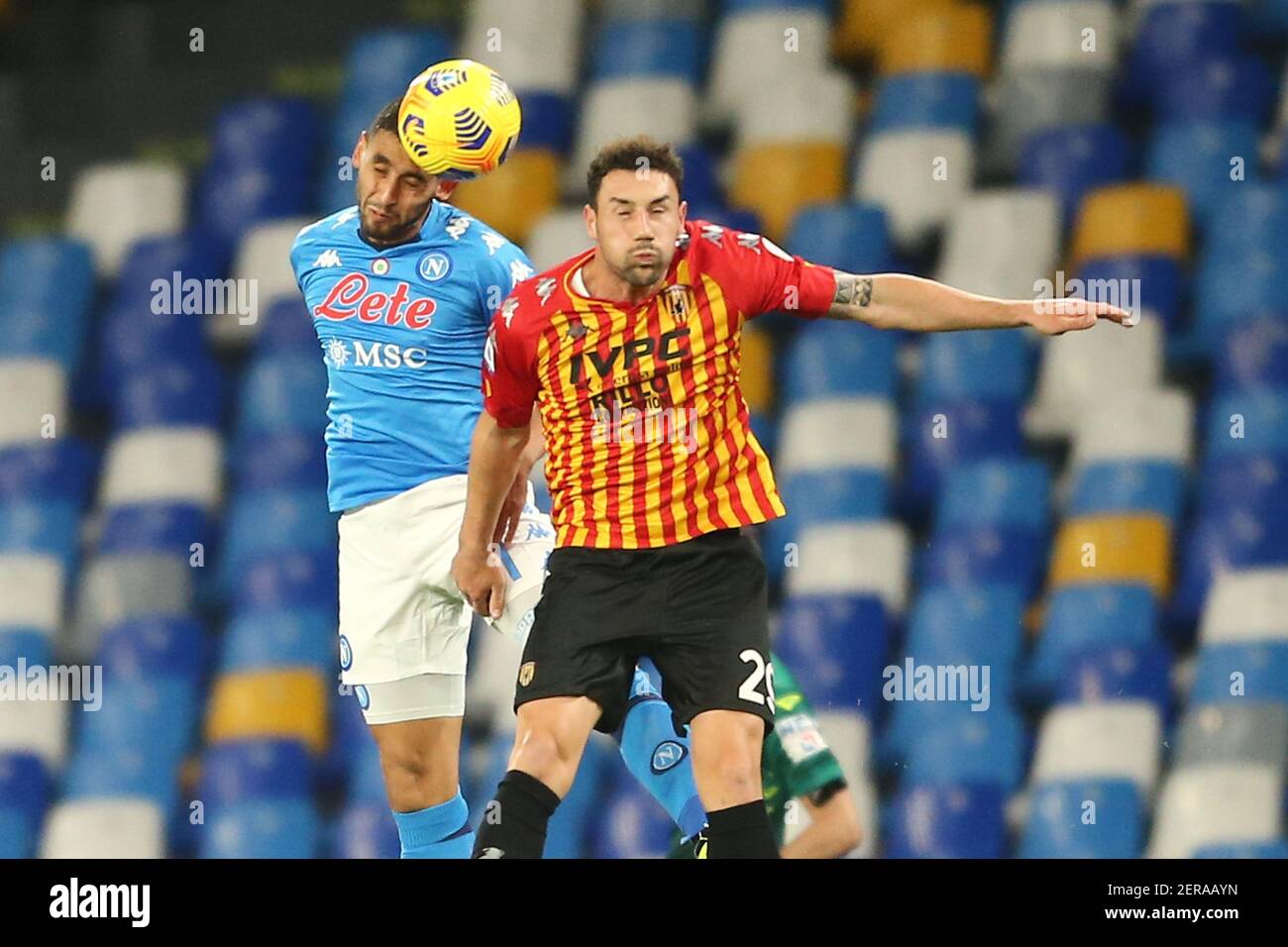 SSC Napoli's Algerian defender Faouzi Ghoulam  (L) challenges for the ball with Benevento's Moldavian defender Artur Ionita during the Serie A football match between SSC Napoli and Benevento at the Diego Armando Maradona Stadium, Naples, Italy, on 03 February  2021 Stock Photo