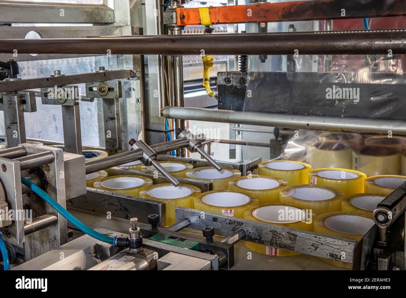 Packing tape factory. Production of duct tape. Strapping Machine for  Industrail Packaging Line, Modern machine for packaging line in factory,  Industri Stock Photo - Alamy