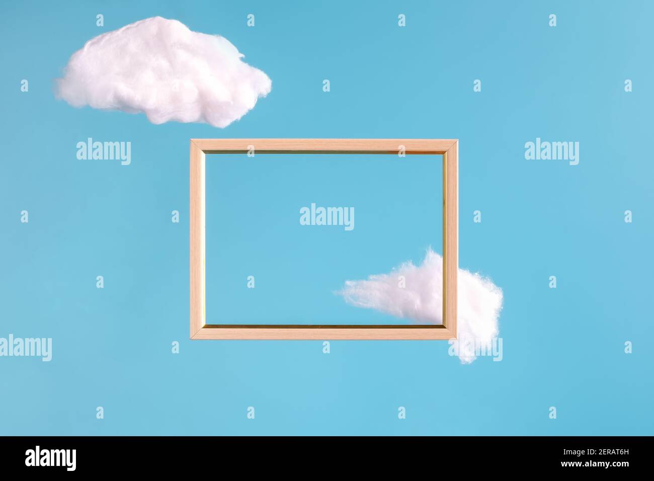 Frame on blue background with abstract clouds  Stock Photo