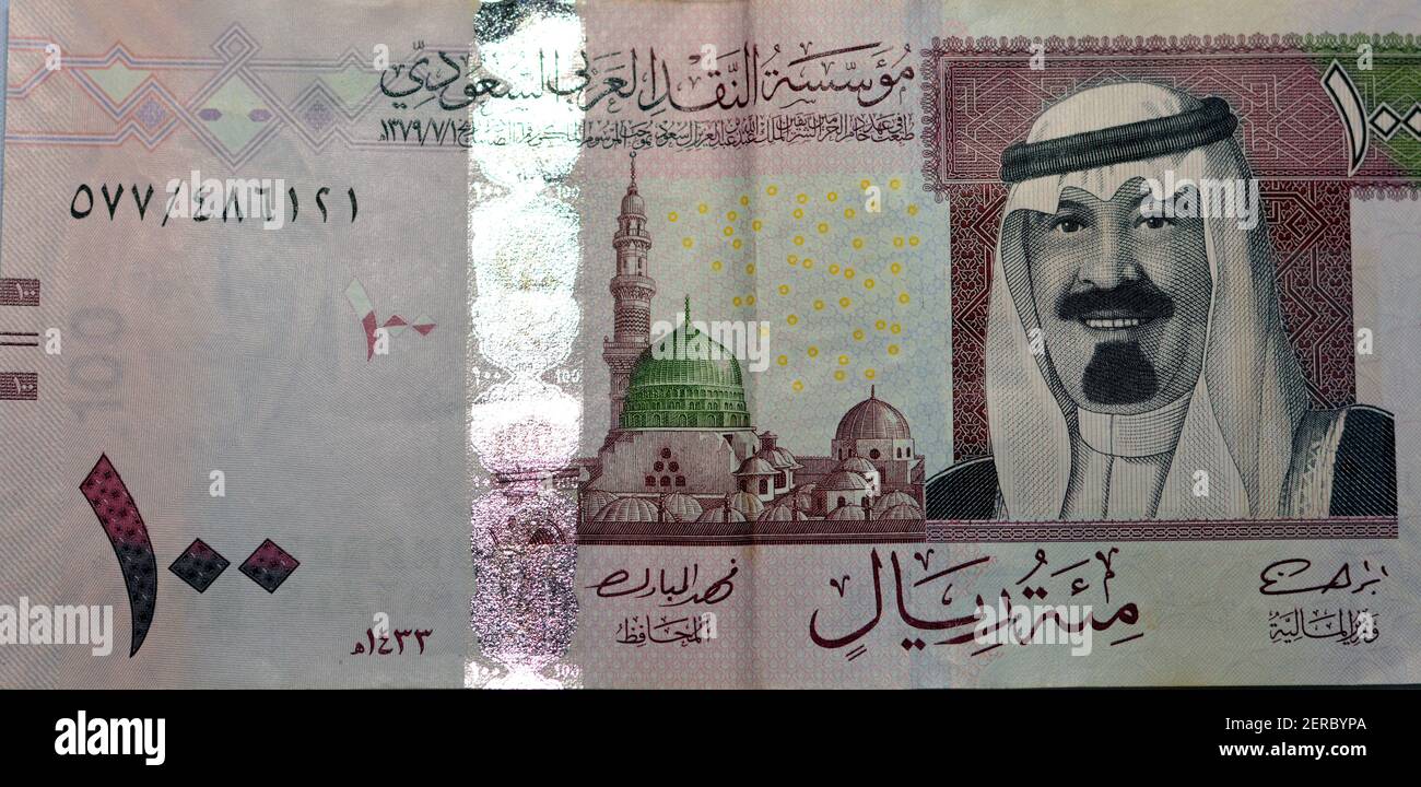 Saudi Arabia 100 riyal banknote, The Saudi riyal is the currency of Saudi  Arabia, selective focus of Saudi kingdom cash money Stock Photo - Alamy