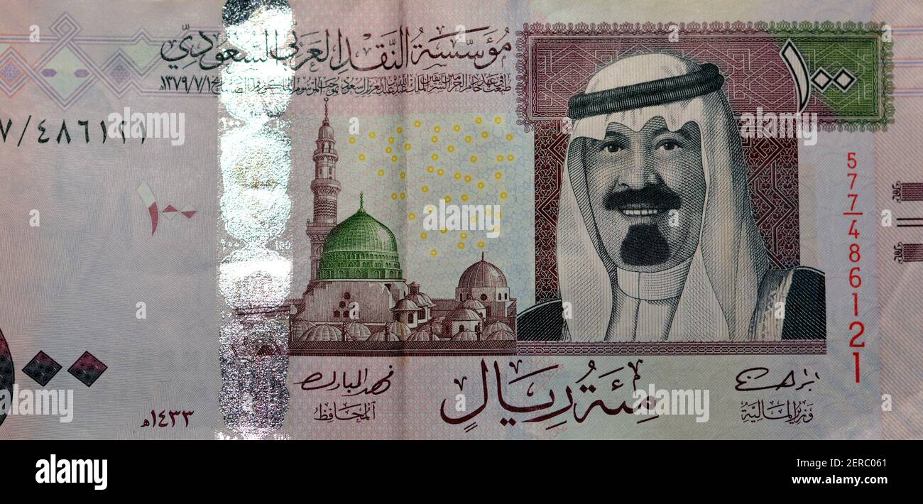 Saudi Arabia 100 riyal banknote, The Saudi riyal is the currency of Saudi  Arabia, selective focus of Saudi kingdom cash money Stock Photo - Alamy