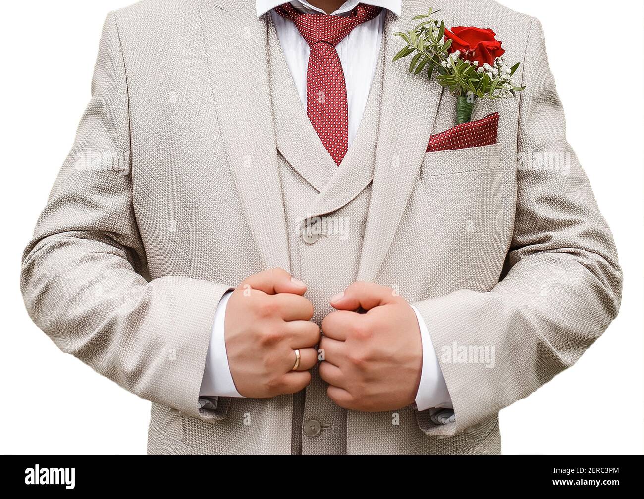light beige suit holds hands 