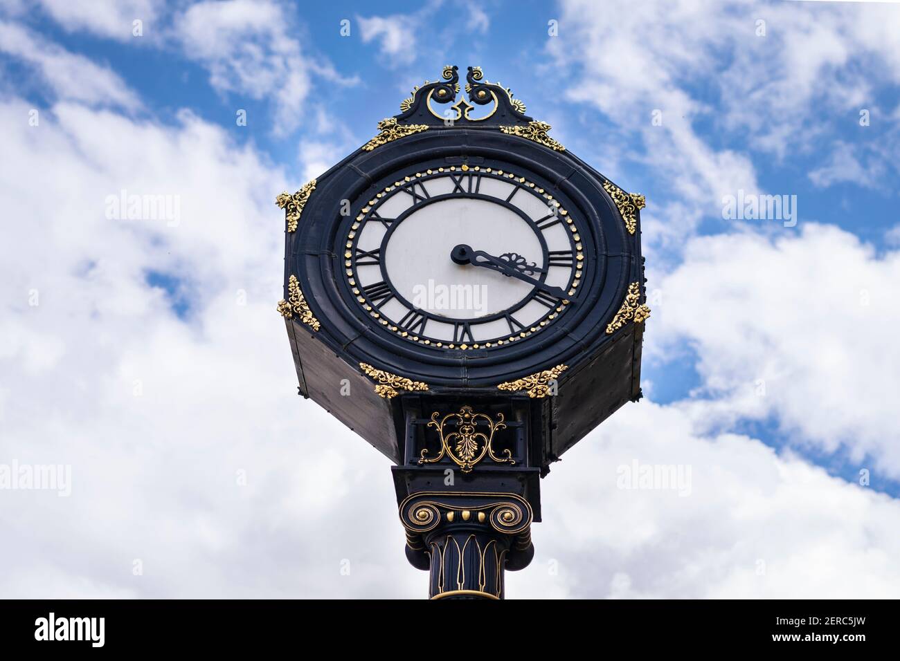 Big clock in the city centre of Stourbridge on sunny day .  Big clock on the blue sky in United Kingdom Stock Photo