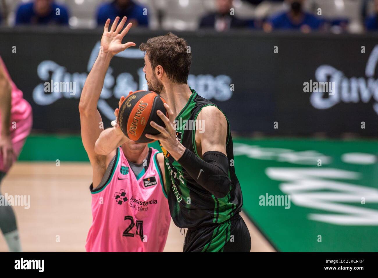 Ante Tomi?, of Badalona and Kyle Kuric of Barcelona are seen in action  during the Spanish basketball league (Liga Endesa) Round 24, match between  Club Joventut Badalona and FC Barcelona Bàsquet at