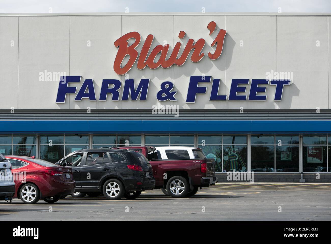 A logo sign outside of a Blain's Farm & Fleet retail store in