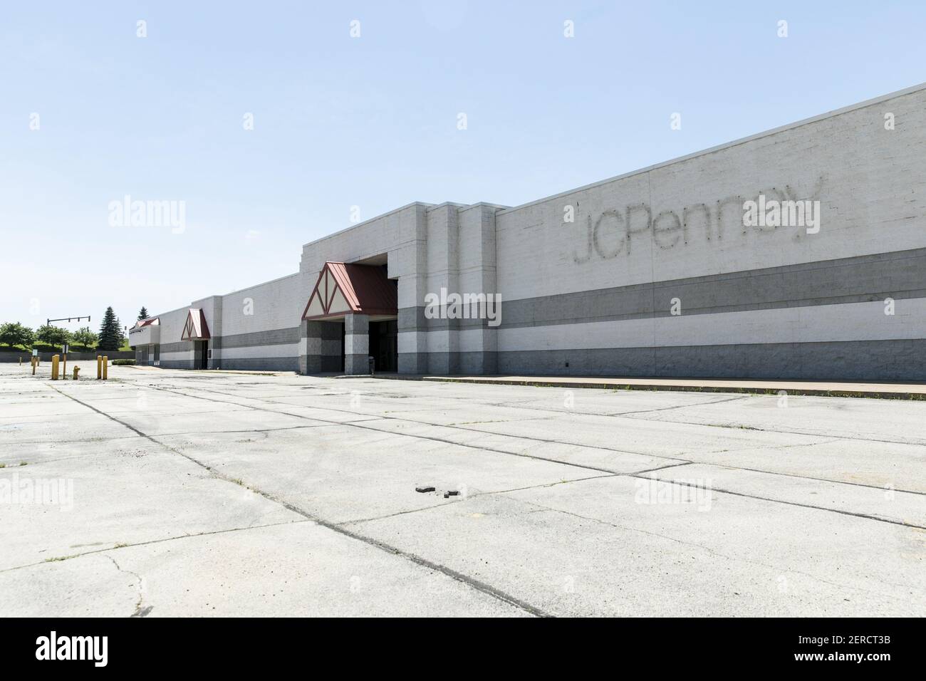 A logo sign outside of an abandoned JCPenney retail store in Oshkosh