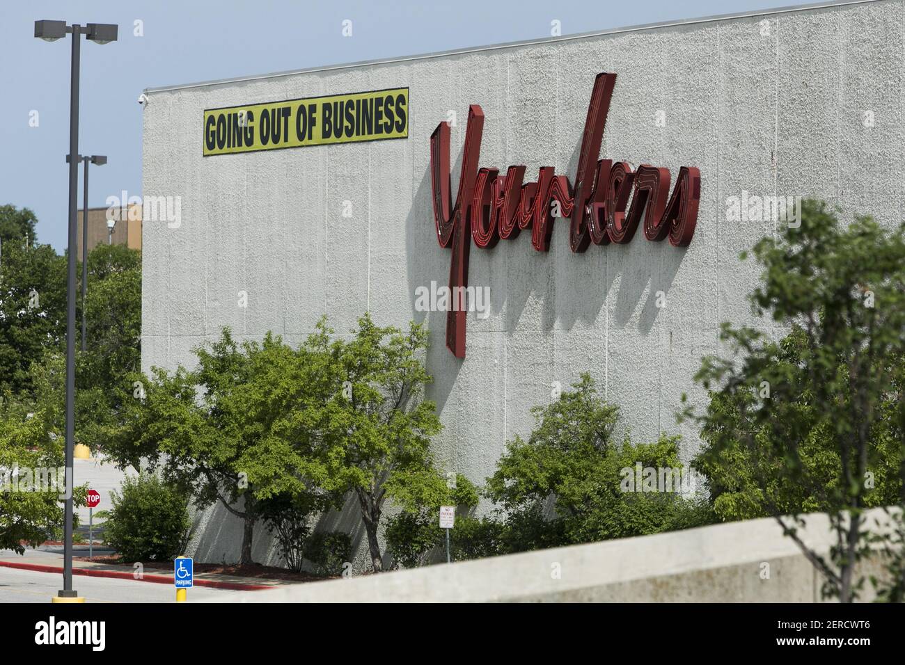 A logo sign and 'Going Out Of Business' banner outside of Younkers ...