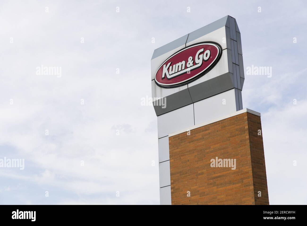 A logo sign outside of the headquarters of Kum & Go in West Des Moines