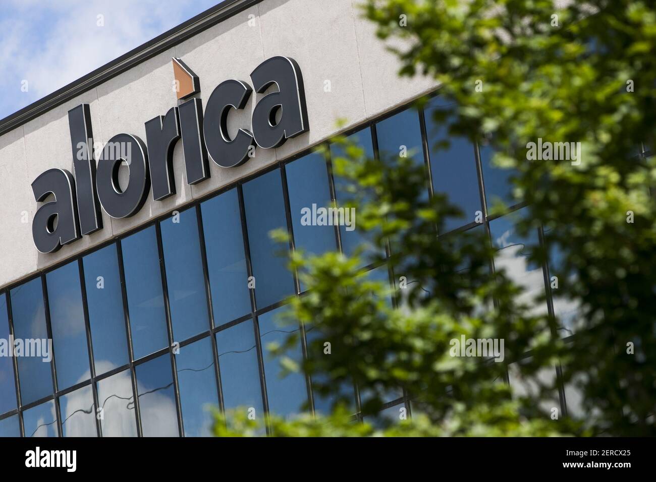 A logo sign outside of a facility occupied by Alorica in Omaha