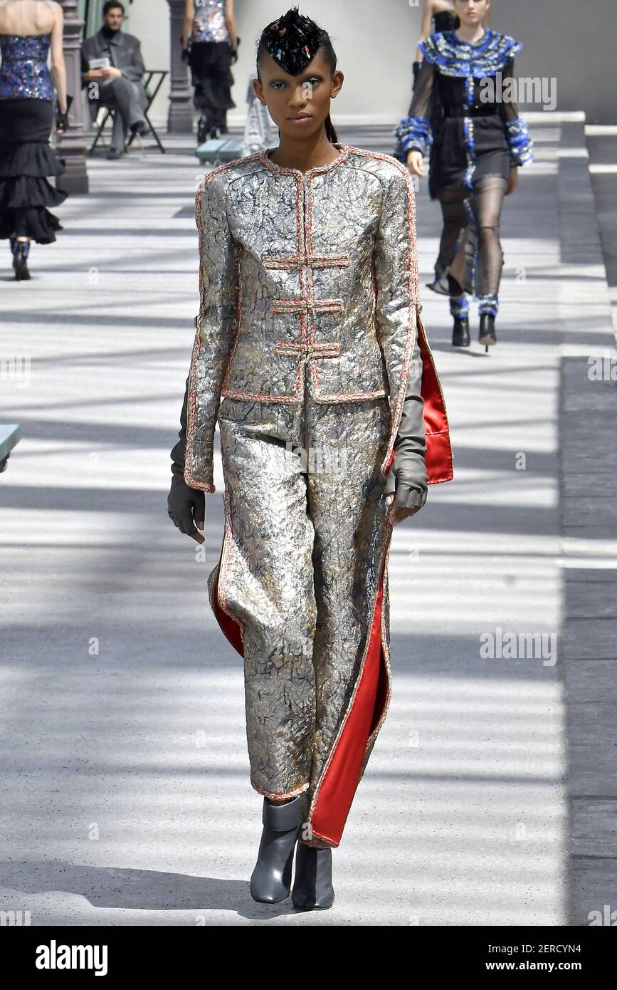 Adesuwa Aighewi walks on the runway during the Chanel Haute