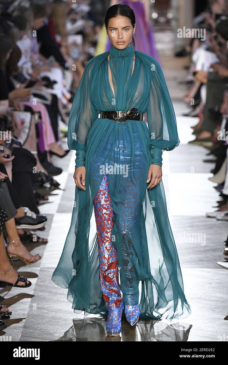 Adriana Lima walks on the runway during the Schiaparelli Haute Couture