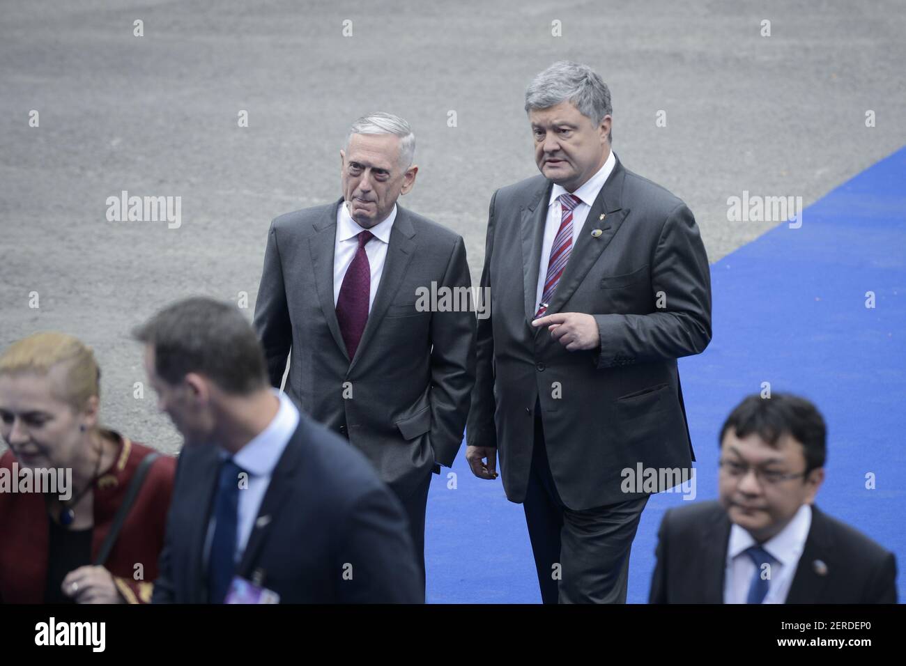 US secretary of defence James Mattis (L) and Ukrainian president Petro Poroshenko (R) are seen arriving at the Cinquantenaire museum for the NATO dinner on July 11, 2018 in Brussels, Belgium. Ukraine has been attempting to secure US help in fighting Russia backed insurgents in the Eastern part of the country. (Photo by Jaap Arriens / Sipa USA) Stock Photo