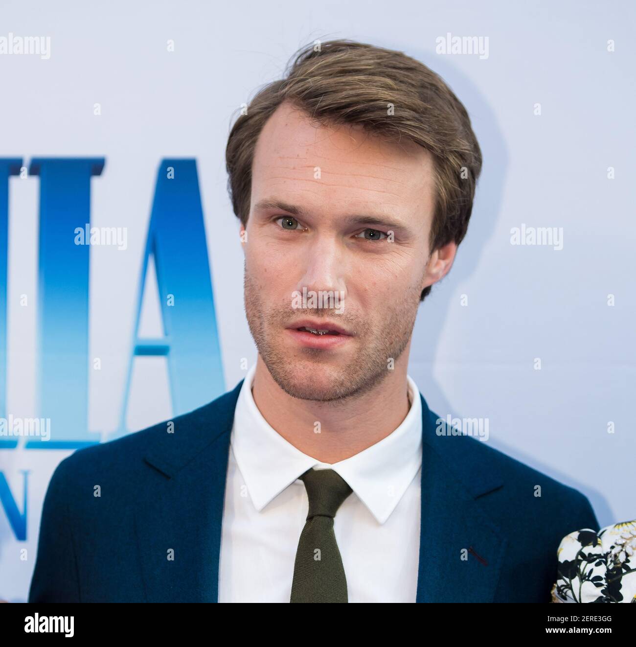 Hugh Skinner on the red carpet during the premiere of movie Mamma Mia