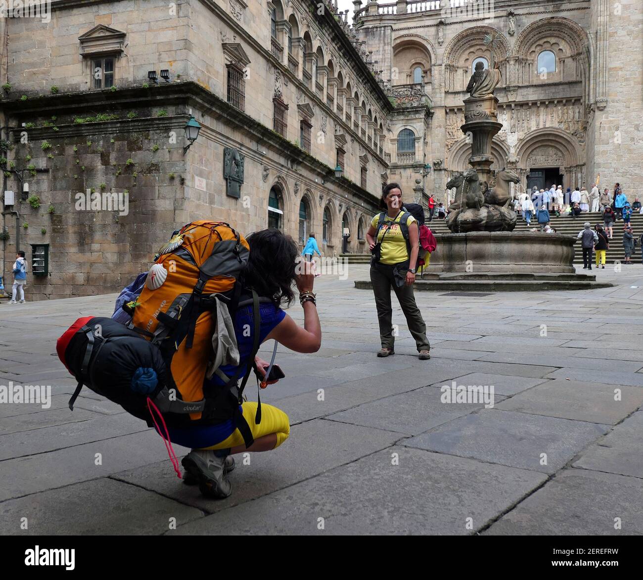 Hikers, called pilgrims, celebrate the end of their journey after