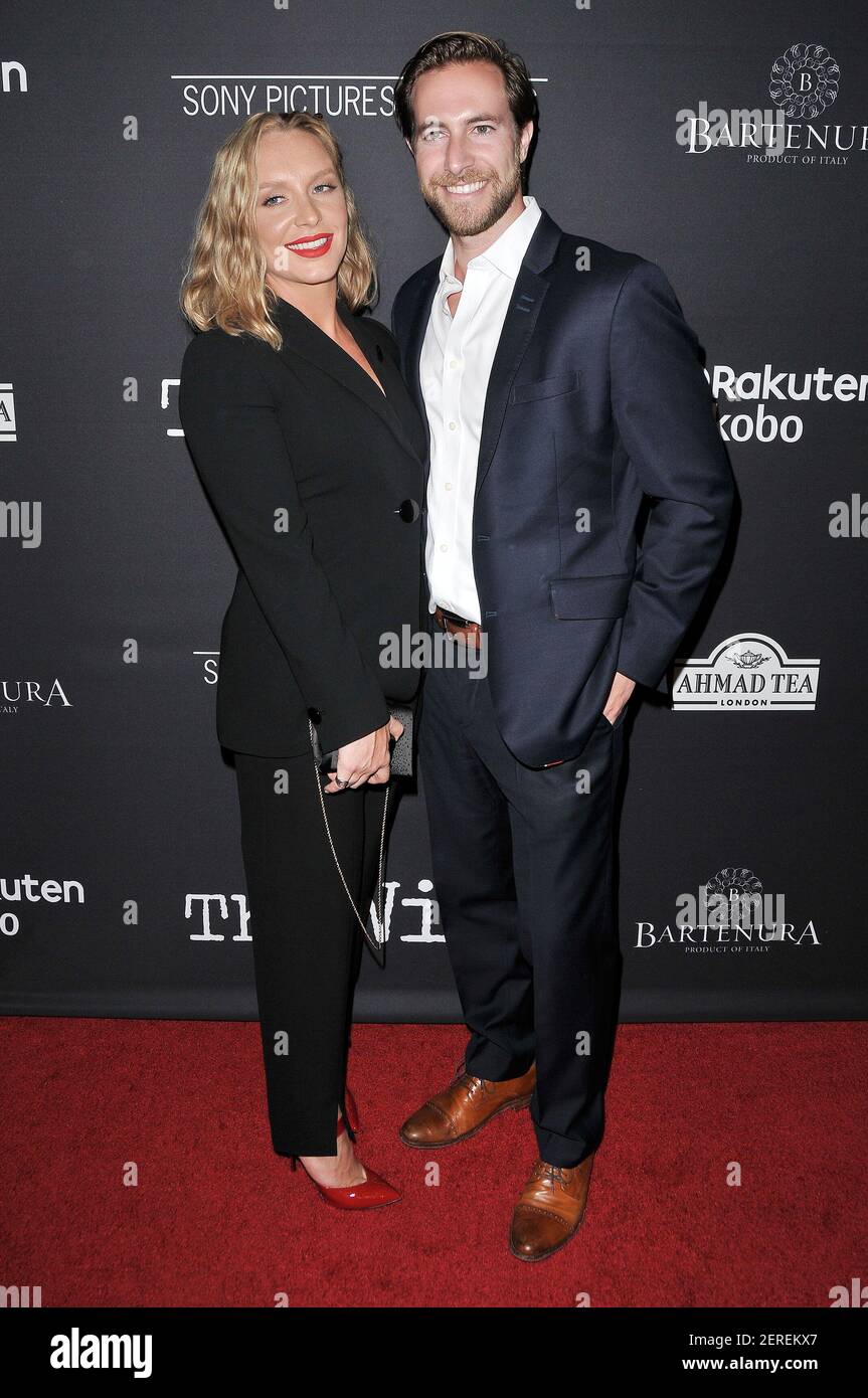 (L-R) Annie Starke and Husband Marc Albu at 