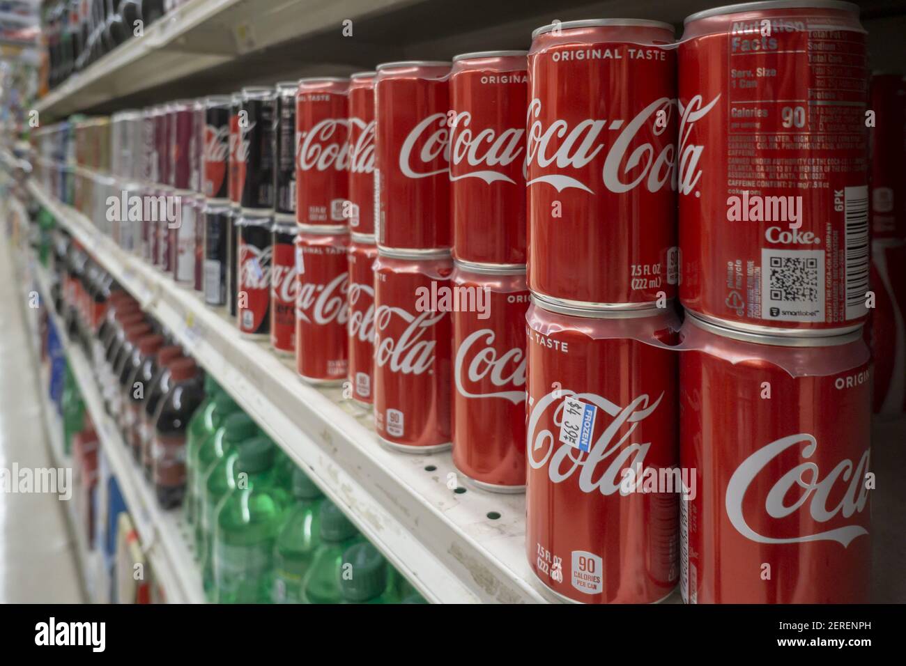 Cans of CocaCola in a supermarket in New York on Tuesday, July 24