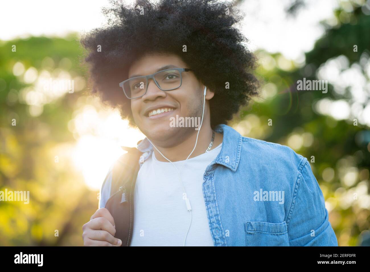 Portrait of young latin man outdoors. Stock Photo