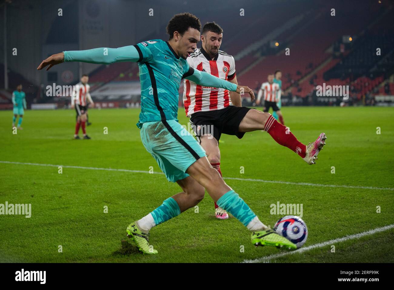 Sheffield. 1st Mar, 2021. Liverpool's Trent Alexander-Arnold crosses the ball during the Premier League football match between Sheffield United FC and Liverpool FC in Sheffield, Britain, on Feb. 28, 2021. Credit: Xinhua/Alamy Live News Stock Photo