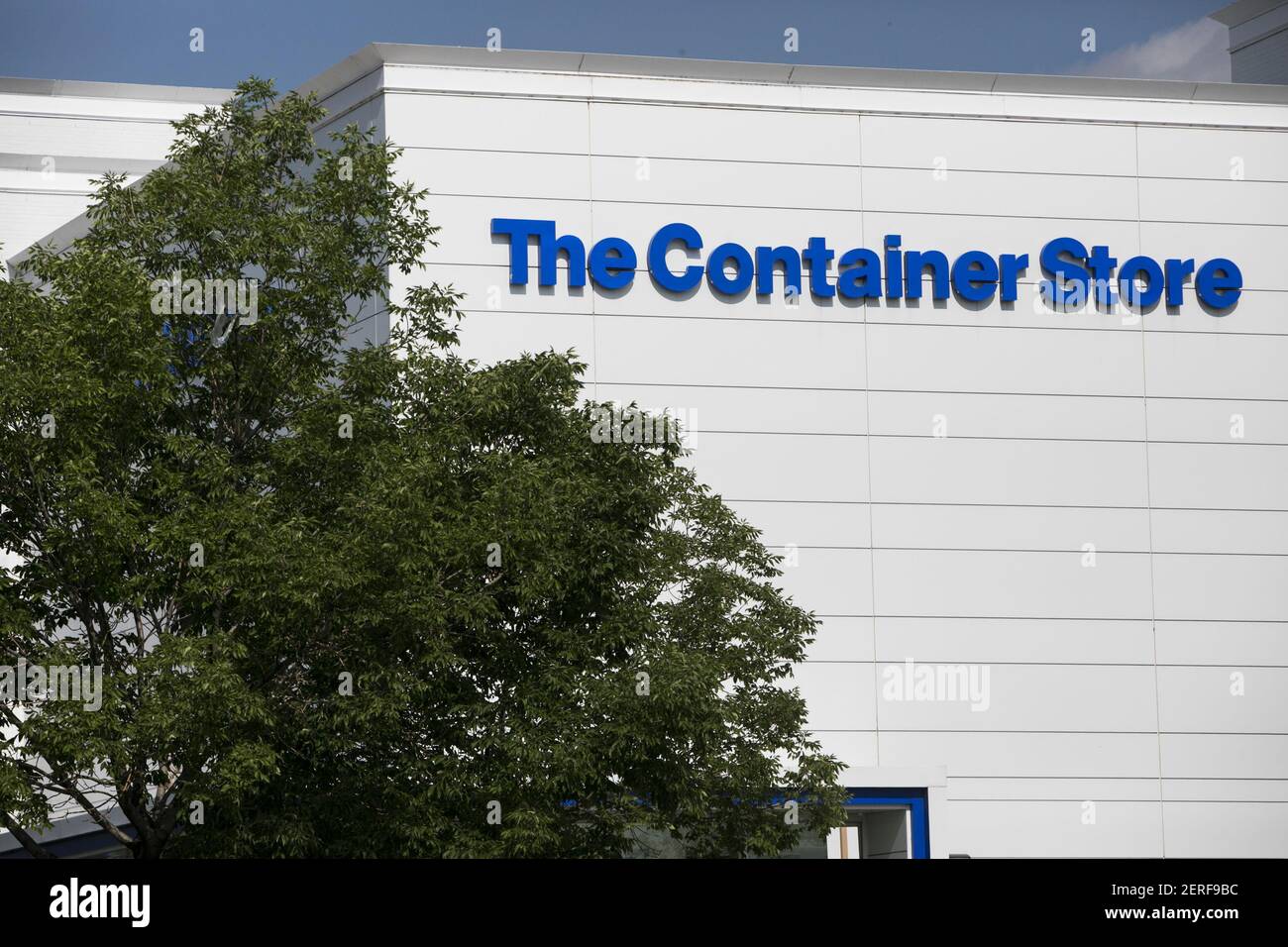 A logo sign outside of a The Container Store retail store in Broomfield ...