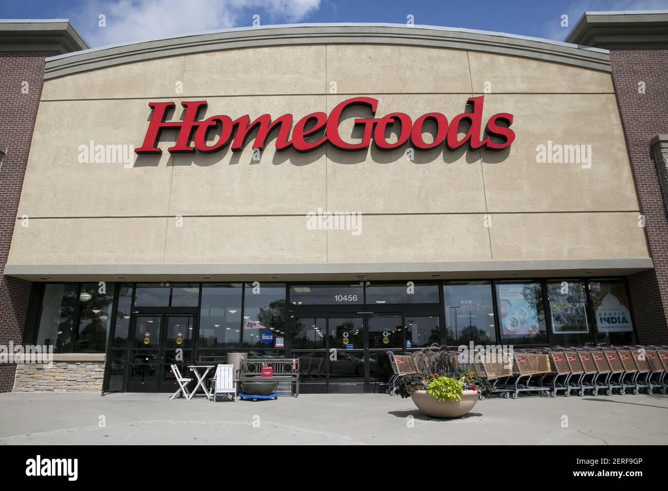 A logo sign outside of a HomeGoods retail store location in Westminster