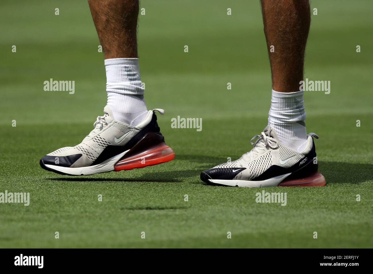 Aug 3, 2018; Akron, OH, USA; A view of the Nike Air Max 270s worn by Ian  Finnis, the caddie for Tommy Fleetwood, as he walks on the fourth hole  fairway during